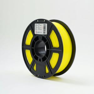 Standard PLA Matte Yellow 1.75mm filament on a plastic spool