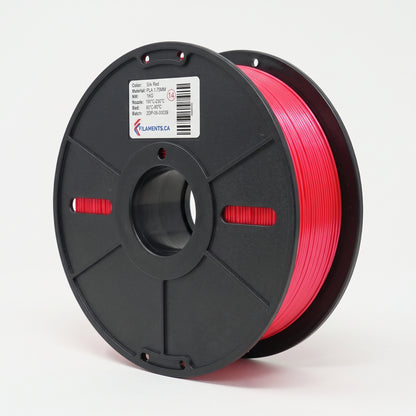 Standard PLA Silk Red 1.75mm filament on a plastic spool